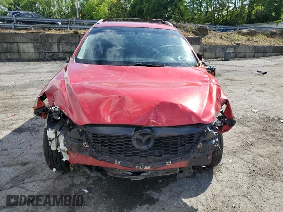 2015 Mazda CX-5 Sport with VIN JM3KE4BY9F0479748, listed as a Copart auction lot 58847805 with 122,698 mi miles and Salvage title. Bid and sale history available at DreamBid. Image 5.
