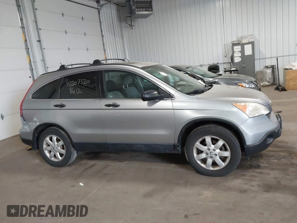 2007 Honda CR-V EX z VIN JHLRE48567C101684, wystawiony jako IAAI lot #42207320 z przebiegiem 190 698 mil mil oraz . Historia ofert i sprzedaży dostępna na DreamBid. Obrazek 13.