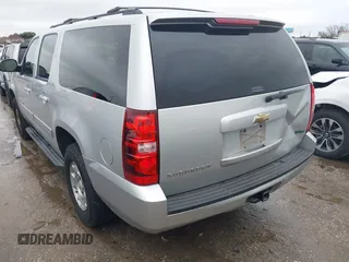 2011 Chevrolet Suburban LS with VIN 1GNSCHE06BR188407, listed as a IAAI auction lot 41453215 with 232,667 mi miles. Bid and sale history available at carsss.com. Image 3.