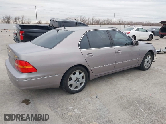 2001 Lexus LS 430 z VIN JTHBN30F210015017, wystawiony jako IAAI lot #41318606 z przebiegiem 173 409 mil mil oraz . Historia ofert i sprzedaży dostępna na DreamBid. Obrazek 4.
