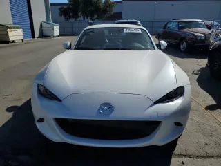 2024 Mazda MX-5 Miata Grand Touring z VIN JM1NDAM76R0602972, wystawiony jako Copart lot #77665904 z przebiegiem 4 965 mil mil oraz Szkoda całkowita • Salvage title. Historia ofert i sprzedaży dostępna na DreamBid. Obrazek 5.