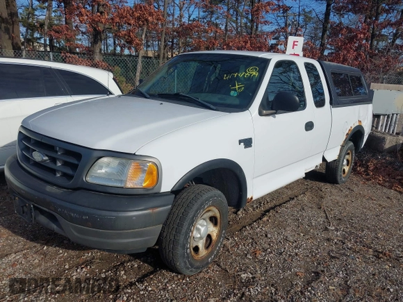 2003 Ford F-150 XL with VIN 2FTRX18W43CA62452, listed as a IAAI auction lot 41497879 with 125,828 mi miles. Bid and sale history available at carsss.com. Image 2.