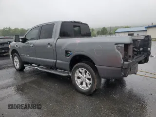 2016 Nissan Titan SL with VIN 1N6BA1F48GN511567, listed as a Copart auction lot 57864775 with 141,545 mi miles and Salvage title. Bid and sale history available at DreamBid. Image 2.