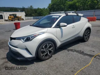 2018 Toyota C-HR XLE with VIN NMTKHMBX6JR027395, listed as a Copart auction lot 63071605 with 124,293 mi miles and Clean title. Bid and sale history available at DreamBid. Image 1.