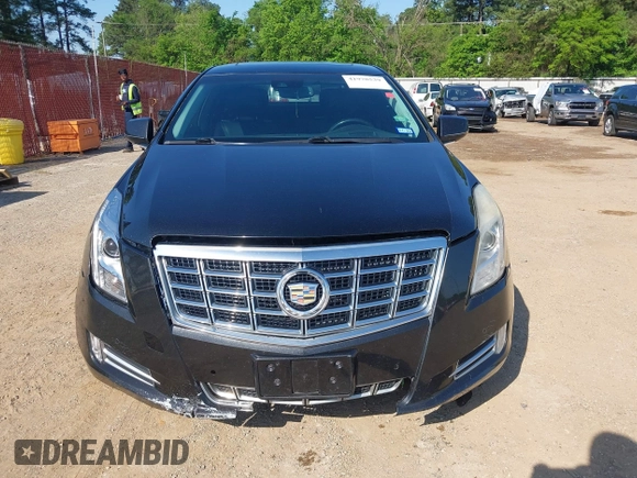 2013 Cadillac XTS Premium z VIN 2G61S5S34D9127996, wystawiony jako IAAI lot #41978539 z przebiegiem 185 157 mil mil oraz . Historia ofert i sprzedaży dostępna na DreamBid. Obrazek 6.