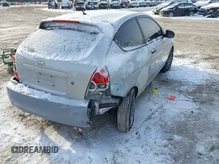 2011 Hyundai Accent GS z VIN KMHCM3AC9BU195826, wystawiony jako IAAI lot #41610260 z przebiegiem 112 508 mil mil oraz . Historia ofert i sprzedaży dostępna na DreamBid. Obrazek 4.