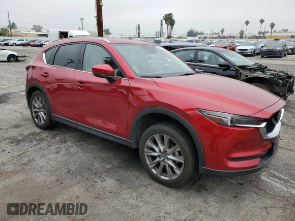 2020 Mazda CX-5 Grand Touring with VIN JM3KFADM1L1837775, listed as a Copart auction lot 55314595 with 82,359 mi miles and Clean Title. Bid and sale history available at DreamBid. Image 4.