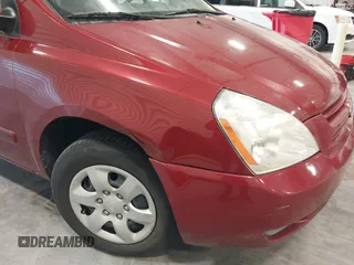 2010 Kia Sedona LX with VIN KNDMG4C35A6343380, listed as a IAAI auction lot 42042669 with 119,648 mi miles. Bid and sale history available at carsss.com. Image 6.