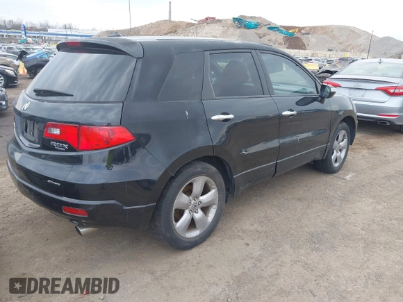 2007 Acura RDX Tech Pkg with VIN 5J8TB18507A013463, listed as a IAAI auction lot 41917940 with 126,533 mi miles. Bid and sale history available at carsss.com. Image 4.