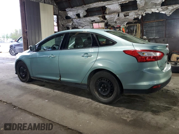 2012 Ford Focus SE with VIN 1FAHP3F27CL149328, listed as a Copart auction lot 56000325 with 147,097 mi miles and Salvage Title. Bid and sale history available at DreamBid. Image 2.