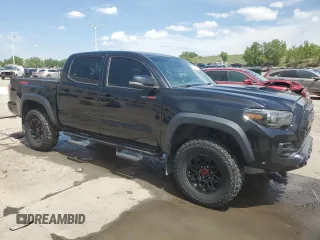 2019 Toyota Tacoma SR with VIN 5TFCZ5ANXKX184626, listed as a Copart auction lot 59220905 with 123,746 mi miles and Salvage title. Bid and sale history available at DreamBid. Image 4.
