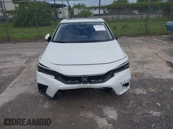 2023 Honda Civic EX-L with VIN 19XFL1H70PE014510, listed as a IAAI auction lot 42395890 with 14,163 mi miles and . Bid and sale history available at DreamBid. Image 12.