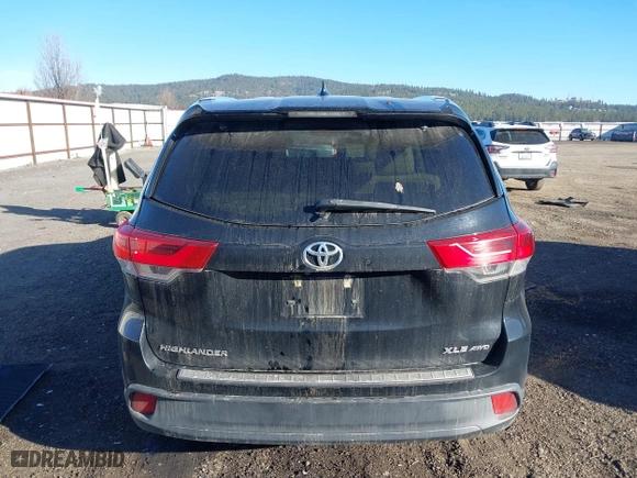 2019 Toyota Highlander SE with VIN 5TDJZRFH3KS580338, listed as a IAAI auction lot 41736059 with 128,487 mi miles. Bid and sale history available at carsss.com. Image 16.