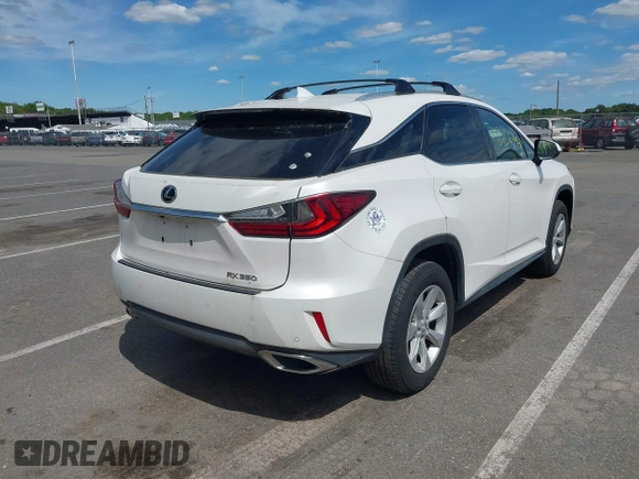 2016 Lexus RX 350 z VIN 2T2BZMCA1GC018531, wystawiony jako IAAI lot #42267497 z przebiegiem 182 473 mil mil oraz . Historia ofert i sprzedaży dostępna na DreamBid. Obrazek 4.
