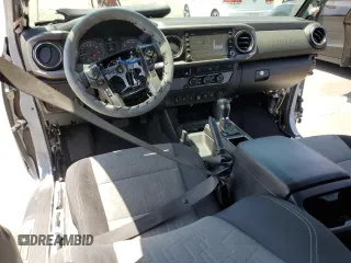 2021 Toyota Tacoma SR5 with VIN 3TMBZ5DNXMM031339, listed as a Copart auction lot 59178515 with 27,885 mi miles and Salvage title. Bid and sale history available at DreamBid. Image 8.