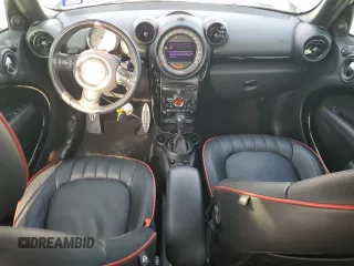 2016 MINI Countryman John Cooper Works with VIN WMWXD1C59GWT97602, listed as a Copart auction lot 52898605 with 141,749 mi miles and Salvage Title. Bid and sale history available at DreamBid. Image 8.