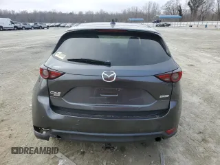 2019 Mazda CX-5 Signature with VIN JM3KFBEY3K0609305, listed as a Copart auction lot 44146455 with 33,104 mi miles and Salvage Title. Bid and sale history available at carsss.com. Image 6.