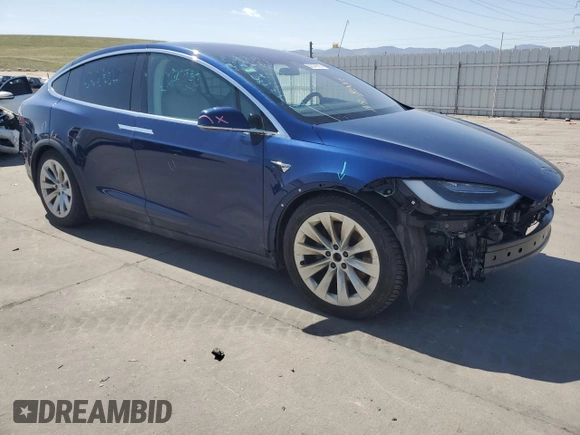 2017 Tesla Model X 90D with VIN 5YJXCDE23HF044790, listed as a Copart auction lot 52376565 with 105,712 mi miles and Salvage Title. Bid and sale history available at DreamBid. Image 4.
