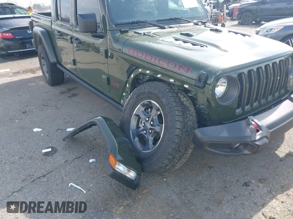 2023 Jeep Gladiator Rubicon with VIN 1C6JJTBGXPL586154, listed as a IAAI auction lot 41370352 with 11,207 mi miles and . Bid and sale history available at DreamBid. Image 6.