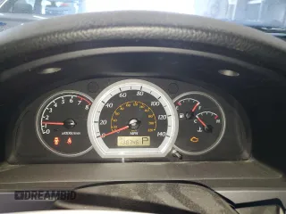 2005 Suzuki Forenza S z VIN KL5JD56Z85K231581, wystawiony jako Copart lot #78122504 z przebiegiem 138 746 mil mil oraz Szkody całkowita. Historia ofert i sprzedaży dostępna na DreamBid. Obrazek 9.