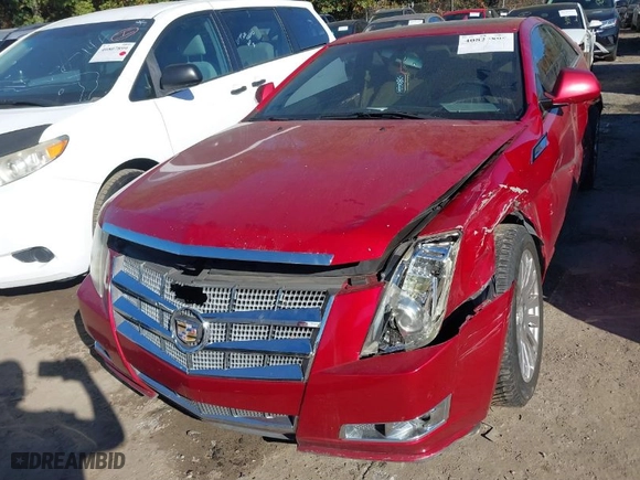 2011 Cadillac CTS Coupe Performance with VIN 1G6DJ1ED8B0154882, listed as a IAAI auction lot 40820898 with 1 mi miles. Bid and sale history available at carsss.com. Image 6.