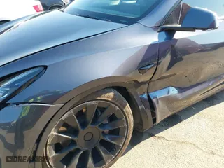 2022 Tesla Model Y Long Range with VIN 7SAYGDEE4NF522698, listed as a IAAI auction lot 41287885 with 82,306 mi miles. Bid and sale history available at carsss.com. Image 6.