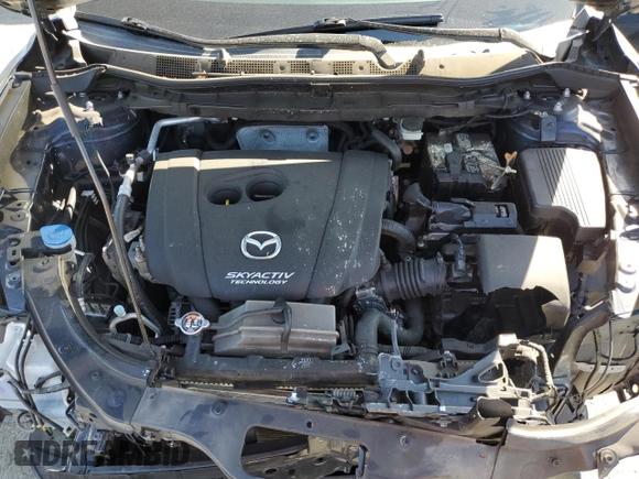 2015 Mazda CX-5 Sport with VIN JM3KE2BEXF0483141, listed as a Copart auction lot 59134105 with 71,727 mi miles and Salvage title. Bid and sale history available at DreamBid. Image 12.