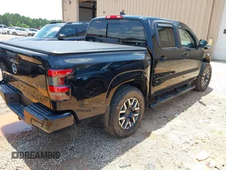 2024 Nissan Frontier Pro-4X with VIN 1N6ED1EK3RN604083, listed as a IAAI auction lot 42479714 with 5,187 mi miles and . Bid and sale history available at DreamBid. Image 4.