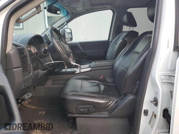 2013 Nissan Titan SV with VIN 1N6AA0EC4DN312512, listed as a Copart auction lot 83015714 with 183,015 mi miles and Salvage title. Bid and sale history available at DreamBid. Image 7.