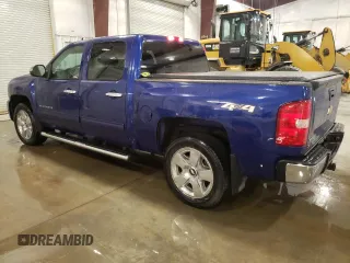 2010 Chevrolet Silverado 1500 LT with VIN 3GCRKSE39AG264945, listed as a Copart auction lot 51769755 with 143,845 mi miles and Salvage Title. Bid and sale history available at DreamBid. Image 2.