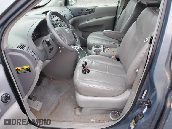 2006 Kia Sedona LX with VIN KNDMB233566097439, listed as a Copart auction lot 77644254 with 124,158 mi miles and Clean Title. Bid and sale history available at carsss.com. Image 7.