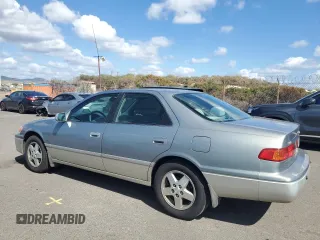 2001 Toyota Camry CE with VIN JT2BG22K610579827, listed as a Copart auction lot 41537605 with 188,136 mi miles and Salvage Title. Bid and sale history available at DreamBid. Image 2.