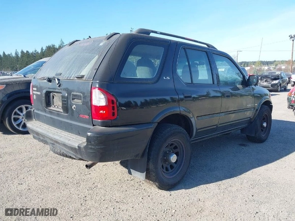 2000 Isuzu Rodeo with VIN 4S2DM58W8Y4348987, listed as a IAAI auction lot 42024517 with 286,400 mi miles. Bid and sale history available at carsss.com. Image 4.