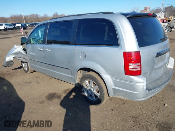 2010 Chrysler Town & Country Touring with VIN 2A4RR5D14AR359169, listed as a IAAI auction lot 41900856 with 204,595 mi miles and . Bid and sale history available at DreamBid. Image 3.