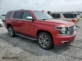 2015 Chevrolet Tahoe LTZ with VIN 1GNSKCKCXFR723104, listed as a Copart auction lot 50660325 with 198,740 mi miles and Salvage Title. Bid and sale history available at carsss.com. Image 4.