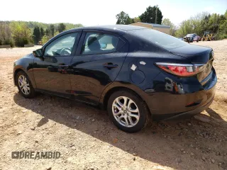 2018 Toyota Yaris with VIN 3MYDLBYV0JY326720, listed as a Copart auction lot 52027505 with 105,127 mi miles and Salvage Title. Bid and sale history available at DreamBid. Image 2.