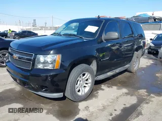 2007 Chevrolet Tahoe LTZ with VIN 1GNFC13J37R134588, listed as a IAAI auction lot 41725727 with 127,540 mi miles and . Bid and sale history available at DreamBid. Image 2.