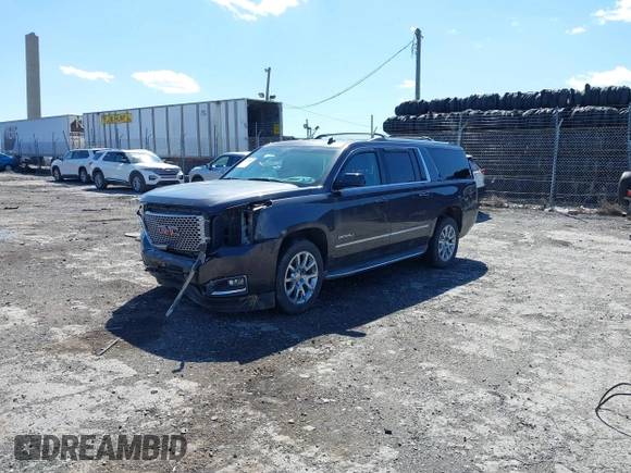 2015 GMC Yukon XL Denali with VIN 1GKS2JKJ5FR144991, listed as a IAAI auction lot 41877853 with 167,814 mi miles. Bid and sale history available at carsss.com. Image 18.