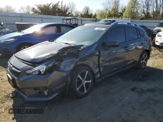 2021 Subaru Impreza Premium z VIN 4S3GTAD64M3712378, wystawiony jako Copart lot #52405735 z przebiegiem 98 077 mil mil oraz Szkoda całkowita • Salvage title. Historia ofert i sprzedaży dostępna na DreamBid. Obrazek 1.