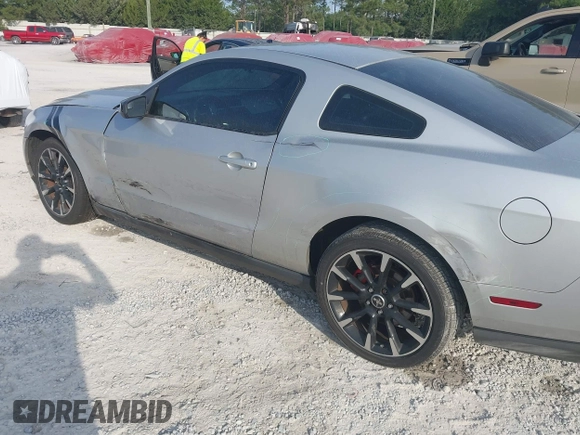 2012 Ford Mustang Premium with VIN 1ZVBP8AM7C5288124, listed as a IAAI auction lot 42280797 with 188,223 mi miles and . Bid and sale history available at DreamBid. Image 6.