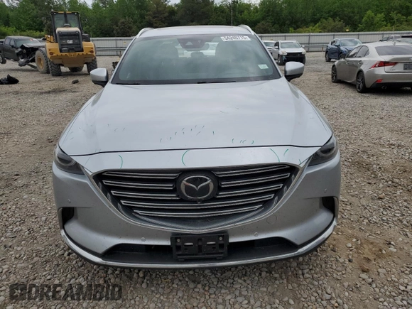 2021 Mazda CX-9 Carbon Edition с VIN JM3TCADY3M0517512, выставлен на аукционе Copart как лот 54240715 с пробегом 89 599 миль миль и Списание • Salvage title. История ставок и продаж доступна на DreamBid. Изображение 5.