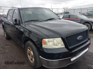 2004 Ford F-150 XLT with VIN 1FTPW12514KA12373, listed as a IAAI auction lot 41959278 with 265,894 mi miles. Bid and sale history available at carsss.com. Image 1.