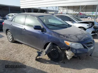 2012 Toyota Corolla L with VIN 2T1BU4EEXCC755207, listed as a IAAI auction lot 41847008 with 143,623 mi miles. Bid and sale history available at carsss.com. Image 1.