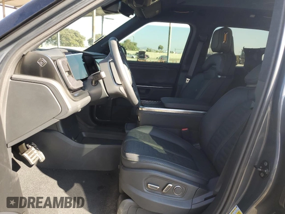 2024 Rivian R1T Adventure with VIN 7FCTGBAA1RN032543, listed as a Copart auction lot 69800484 with Not Provided miles and Salvage Title. Bid and sale history available at carsss.com. Image 7.