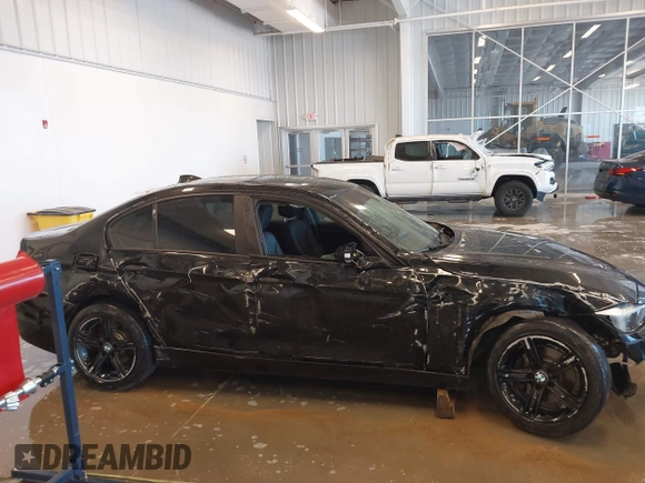 2015 BMW 3 Series 320i xDrive with VIN WBA3C3C56FK203031, listed as a IAAI auction lot 41012182 with 83,611 mi miles and . Bid and sale history available at DreamBid. Image 13.