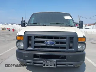 2014 Ford Econoline Cargo Commercial with VIN 1FTNE1EW4EDA90117, listed as a IAAI auction lot 42063775 with 276,021 mi miles and . Bid and sale history available at DreamBid. Image 6.