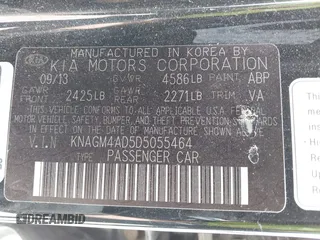 2013 Kia Optima Hybrid EX with VIN KNAGM4AD5D5055464, listed as a IAAI auction lot 42114901 with 140,652 mi miles. Bid and sale history available at carsss.com. Image 9.