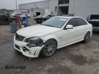 2009 Mercedes-Benz C 63 AMG with VIN WDDGF77X39F284619, listed as a Copart auction lot 61076125 with 108,601 mi miles and Salvage title. Bid and sale history available at DreamBid. Image 1.