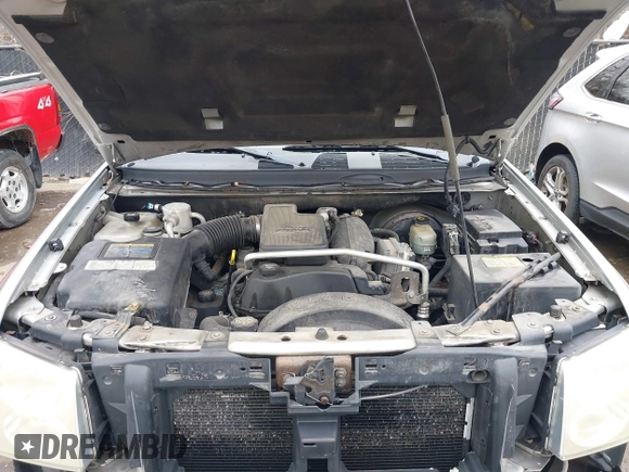 2005 GMC Envoy SLE with VIN 1GKDT13S552332088, listed as a IAAI auction lot 41699178 with 196,869 mi miles. Bid and sale history available at carsss.com. Image 10.