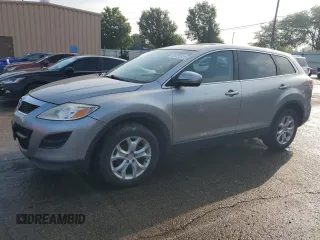 2011 Mazda CX-9 Sport z VIN JM3TB2BA0B0326206, wystawiony jako Copart lot #58232515 z przebiegiem 213 576 mil mil oraz Czysty tytuł • Clean title. Historia ofert i sprzedaży dostępna na DreamBid. Obrazek 1.